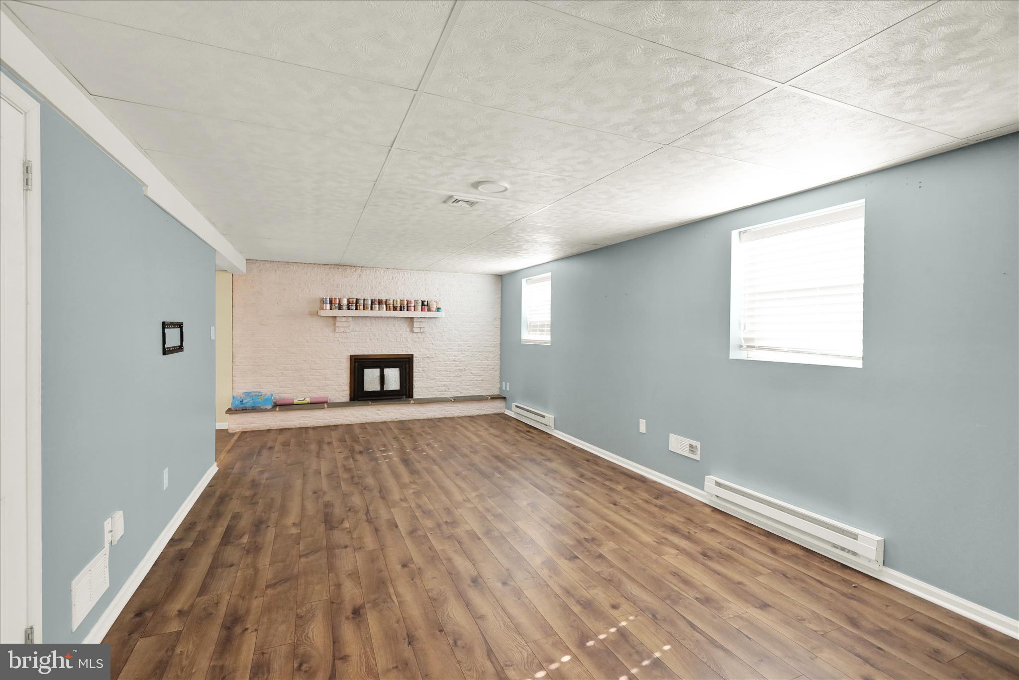 302 South Tulpehocken Road Reading, PA 19601 - Photo 35 of 44 a big room with wooden floor and a window