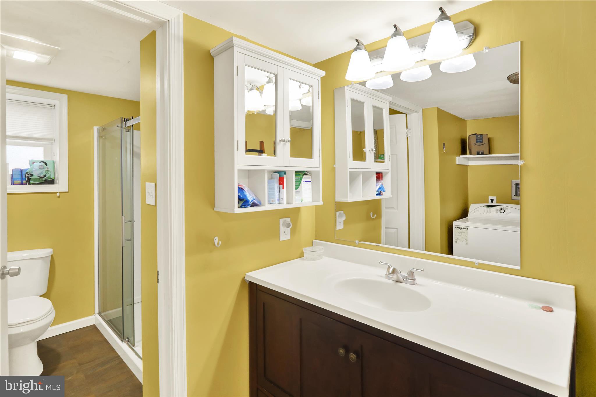 302 South Tulpehocken Road Reading, PA 19601 - Photo 40 of 44 a bathroom with a sink a toilet and a mirror