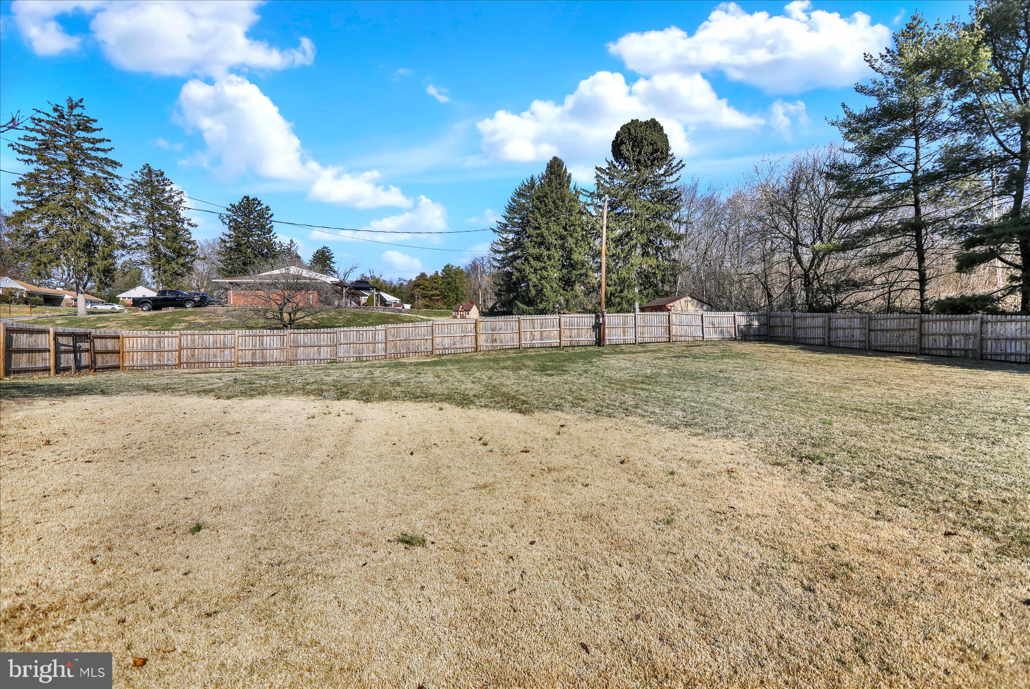 302 South Tulpehocken Road Reading, PA 19601 - Photo 8 of 44 a view of a yard with wooden fence