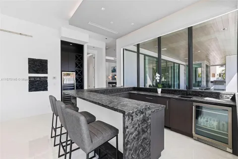 a view of living room with furniture and window
