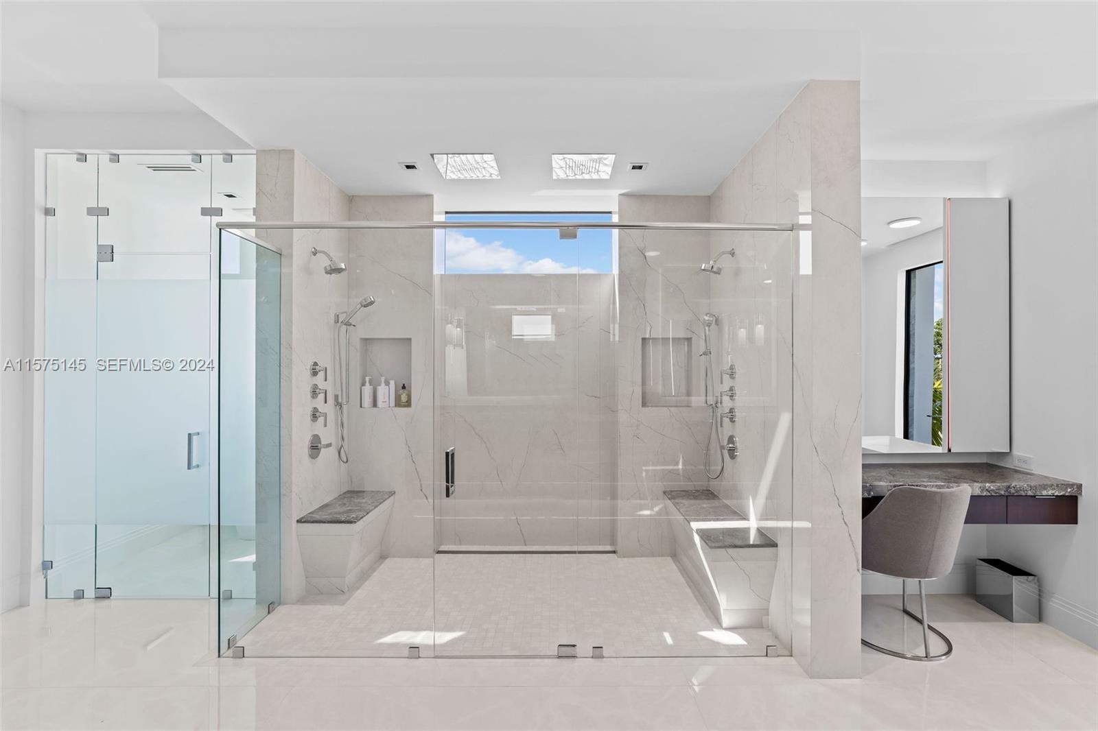 749 Bamboo Drive Boca Raton, FL 33432 - Photo 75 of 91 a bathroom with a shower and a tub