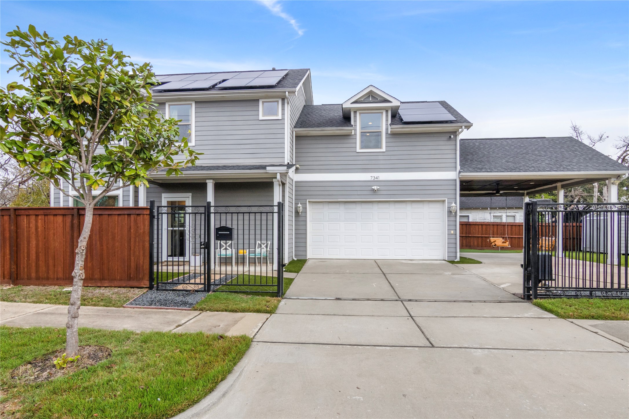 a front view of a house with a garage