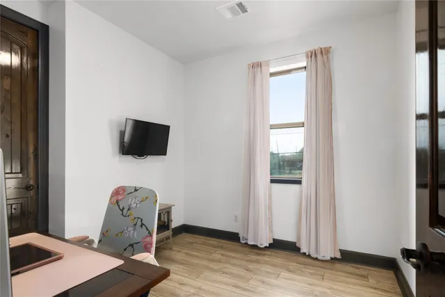 a view of a room with gym equipment