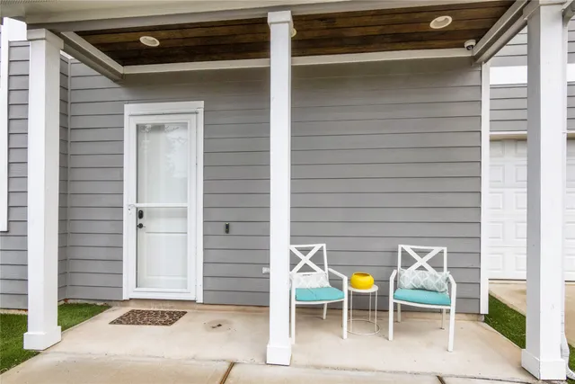 a view of sitting area in front of house