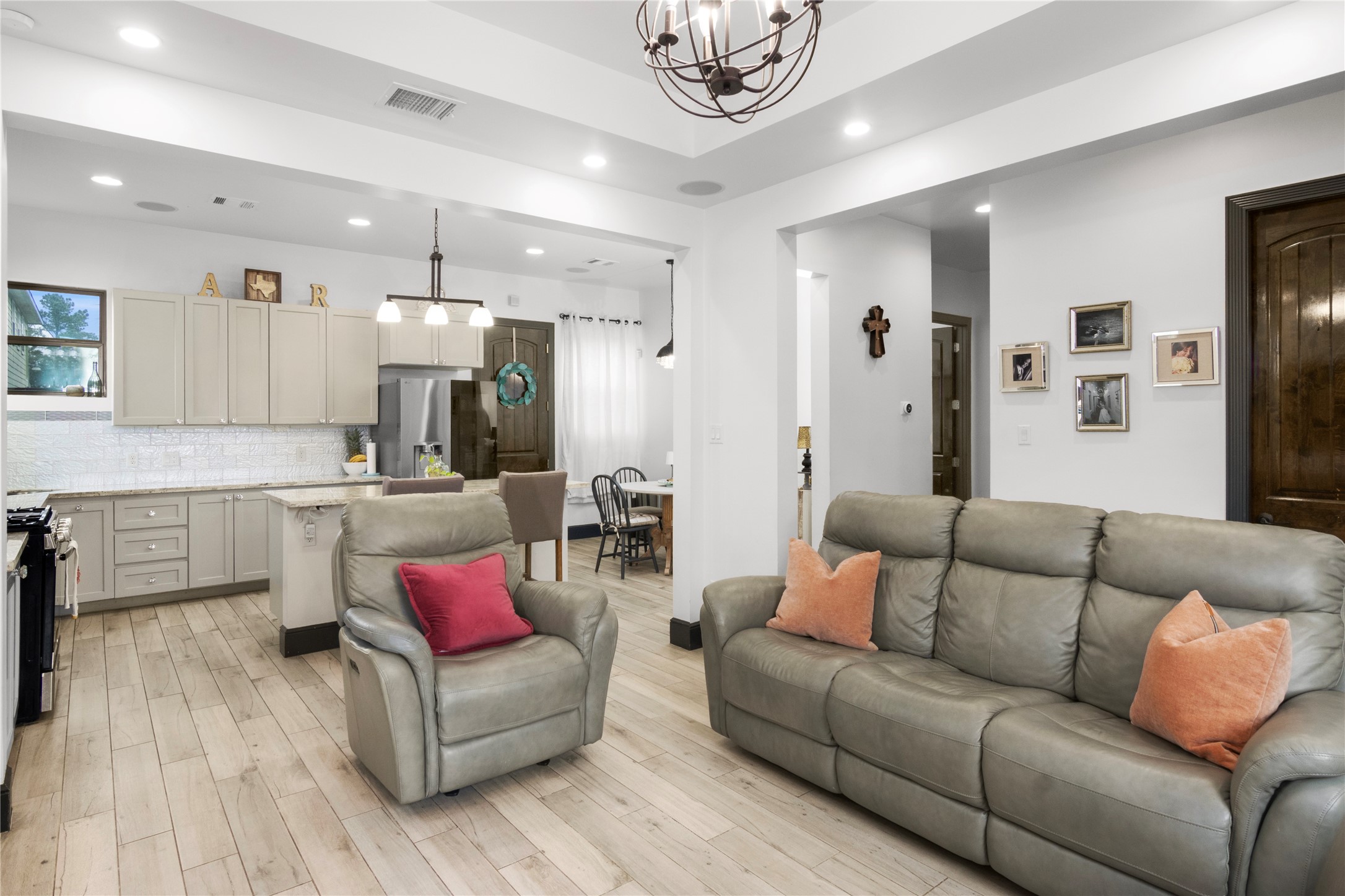 7341 Ave East Houston, TX 77011 - Photo 9 of 33 a living room with furniture and kitchen view