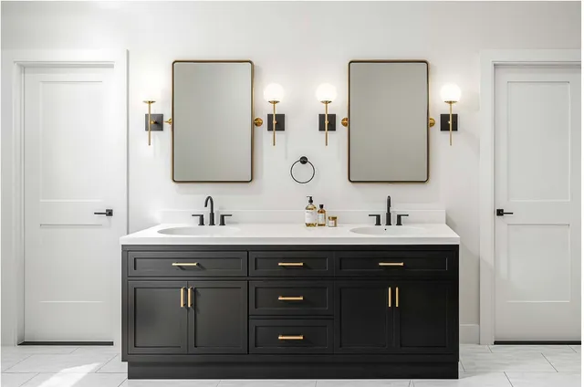a bathroom with a double vanity sink and mirror