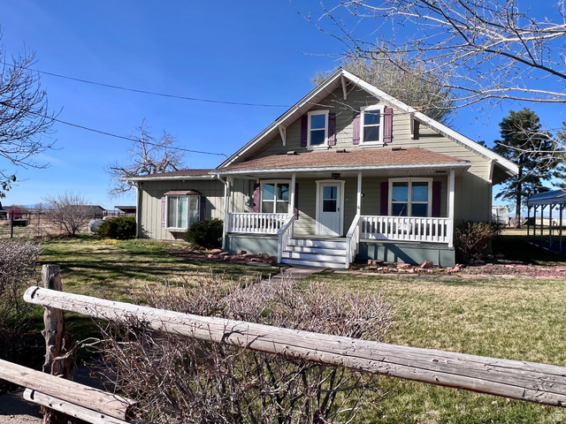 479 East 100 N Road Meadow, UT 84644 - Photo 2 of 59 Bungalow-style home featuring covered porch, a front yard, and a shingled roof