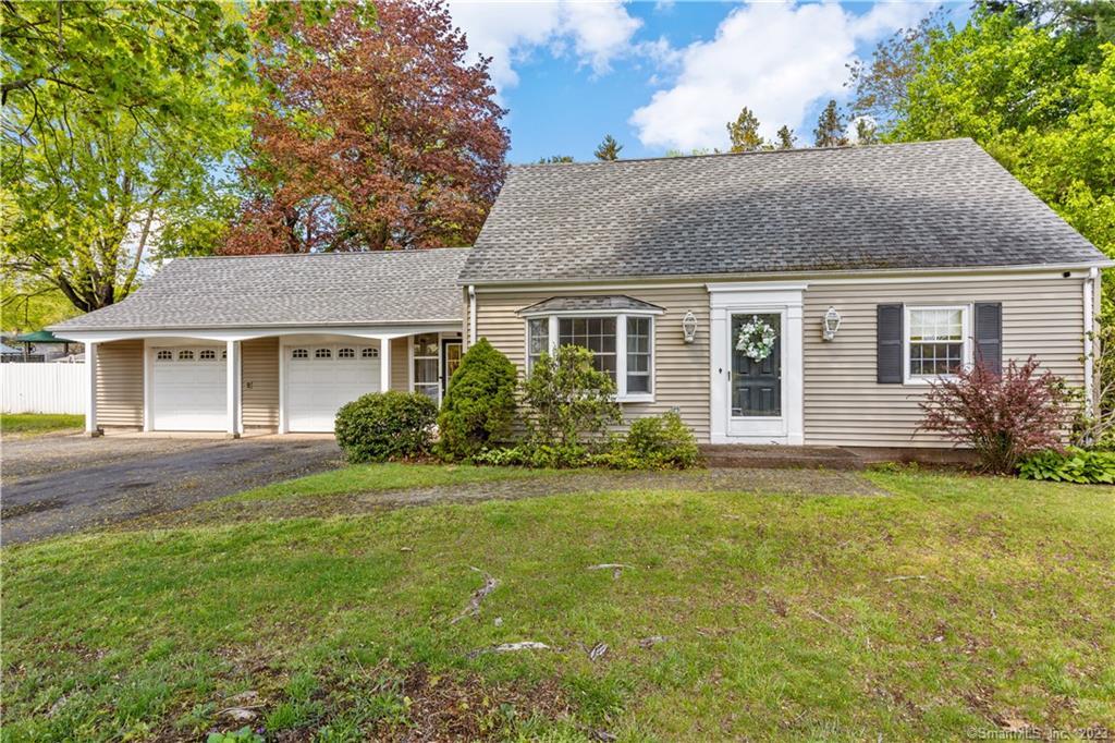 99 Pool Road North Haven, CT 06473 - Photo 1 of 1 a front view of a house with a garden