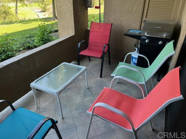 12260 Corte Sabio, Unit 5103 San Diego, CA 92128 - Photo 9 of 10 a view of balcony with furniture