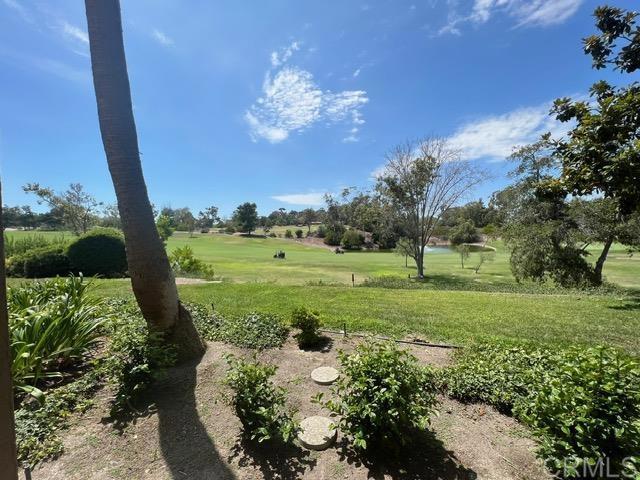 12260 Corte Sabio, Unit 5103 San Diego, CA 92128 - Photo 10 of 10 a view of a golf club with a big yard