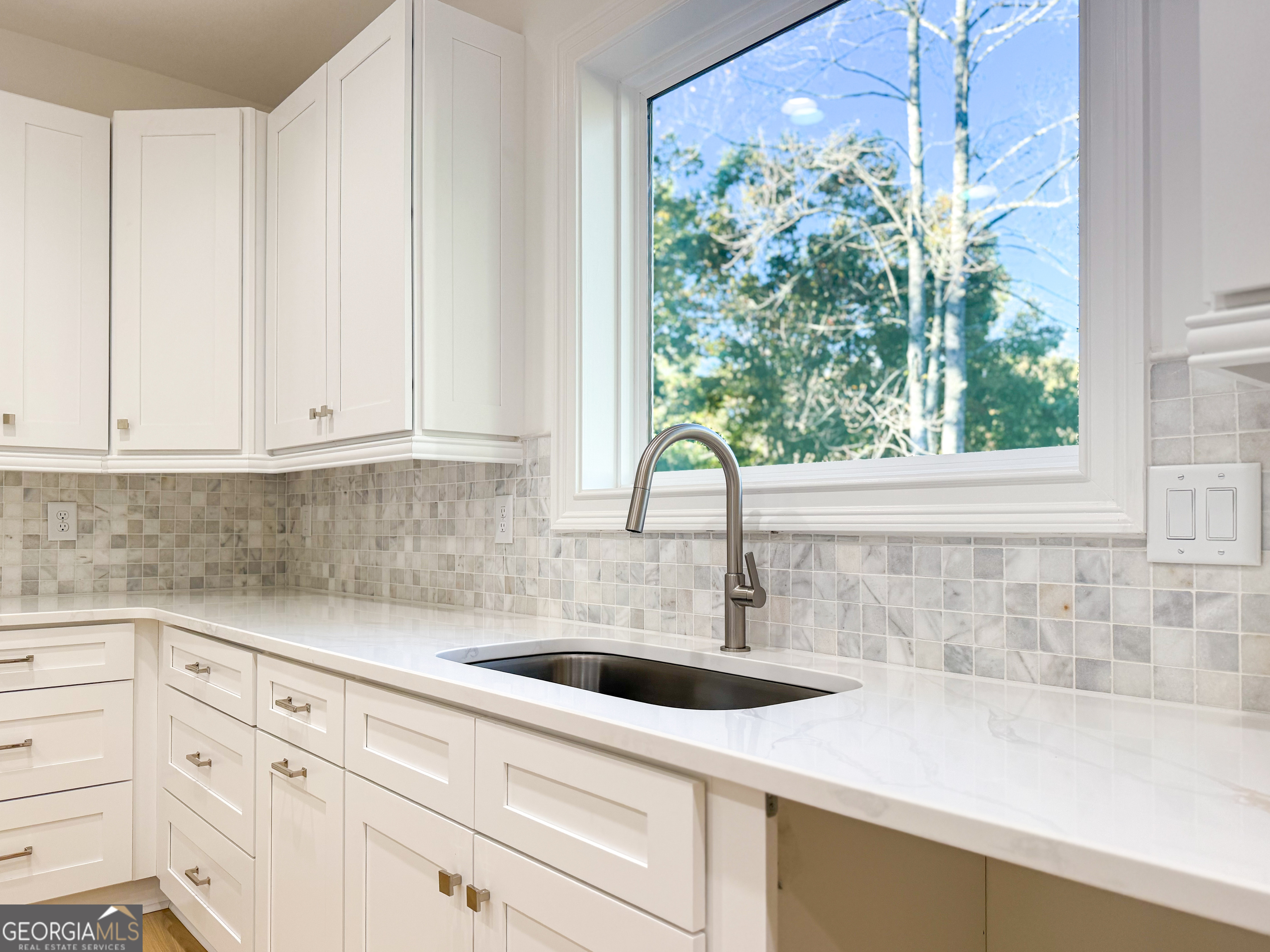 2125 Goat Neck Road Cleveland, GA 30528 - Photo 12 of 24 a kitchen with a sink and cabinets