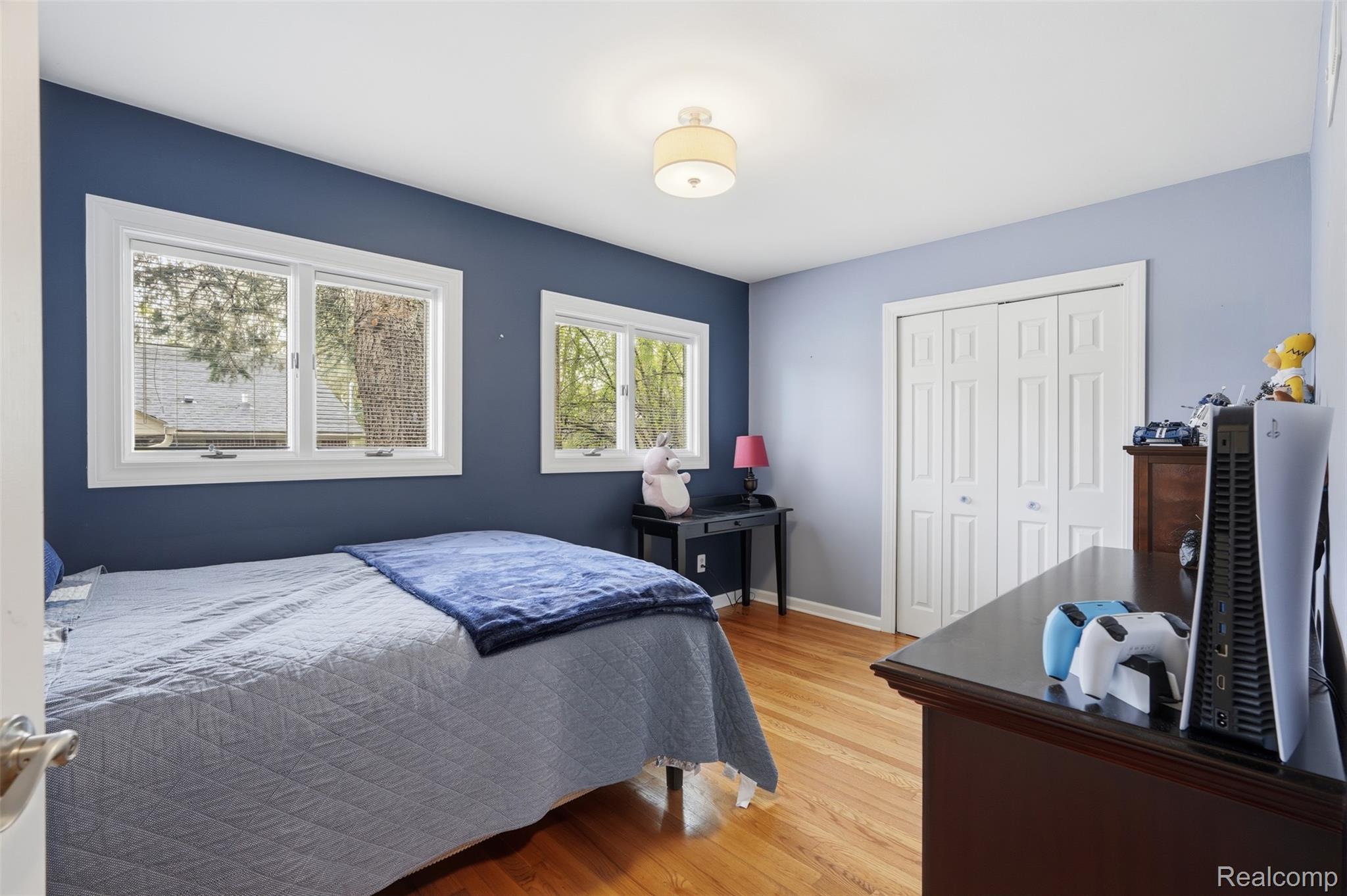 2210 Lancaster Road Bloomfield Hills, MI 48302 - Photo 23 of 35 Bedroom featuring light wood-style floors and a closet