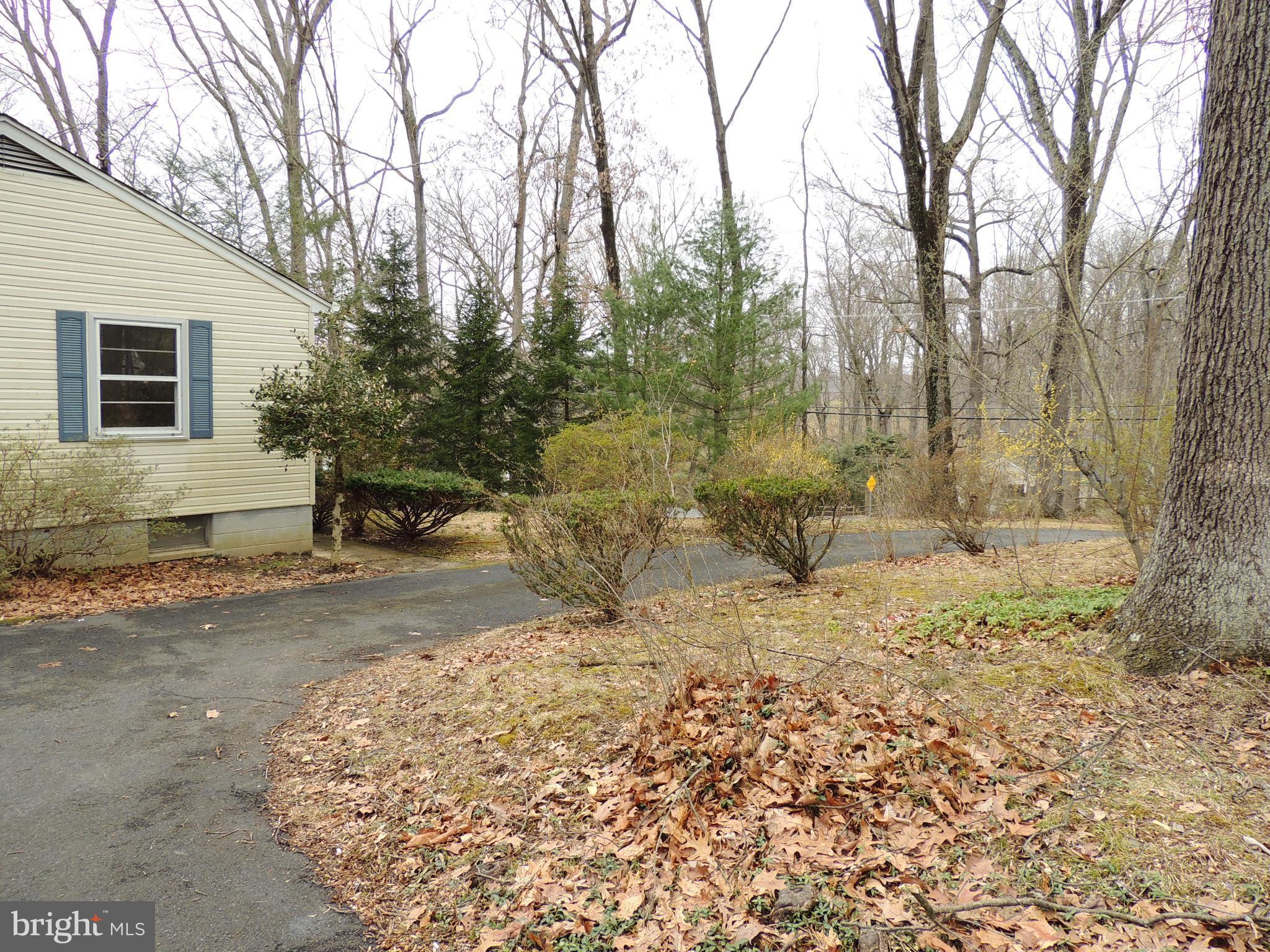 1115 Vale Road Bel Air, MD 21014 - Photo 4 of 12 a view of a yard with large trees