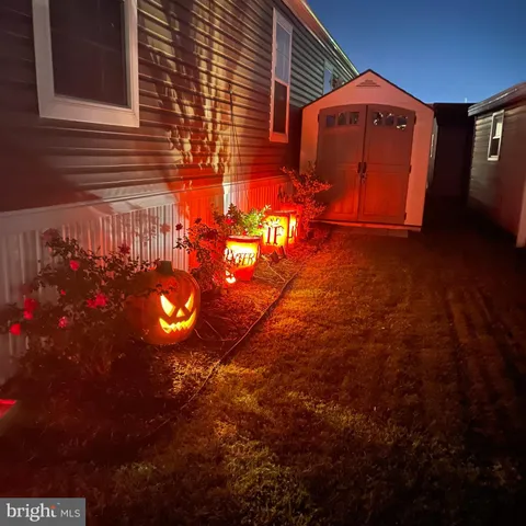 a view of a backyard of the house