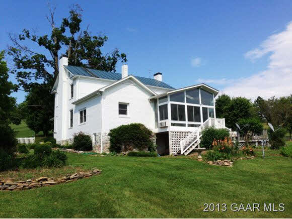 1766 Moffett Branch Road Churchville, VA 24421 - Photo 11 of 32 a front view of a house with a garden and trees