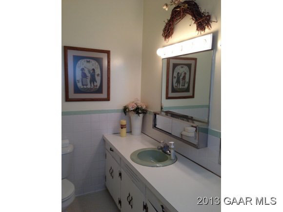 1766 Moffett Branch Road Churchville, VA 24421 - Photo 18 of 32 a bathroom with a sink and a mirror