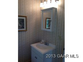1766 Moffett Branch Road Churchville, VA 24421 - Photo 29 of 32 a bathroom with a sink and a mirror