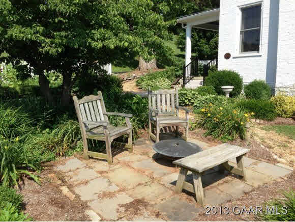 1766 Moffett Branch Road Churchville, VA 24421 - Photo 8 of 32 a view of a chairs and table in backyard of the house