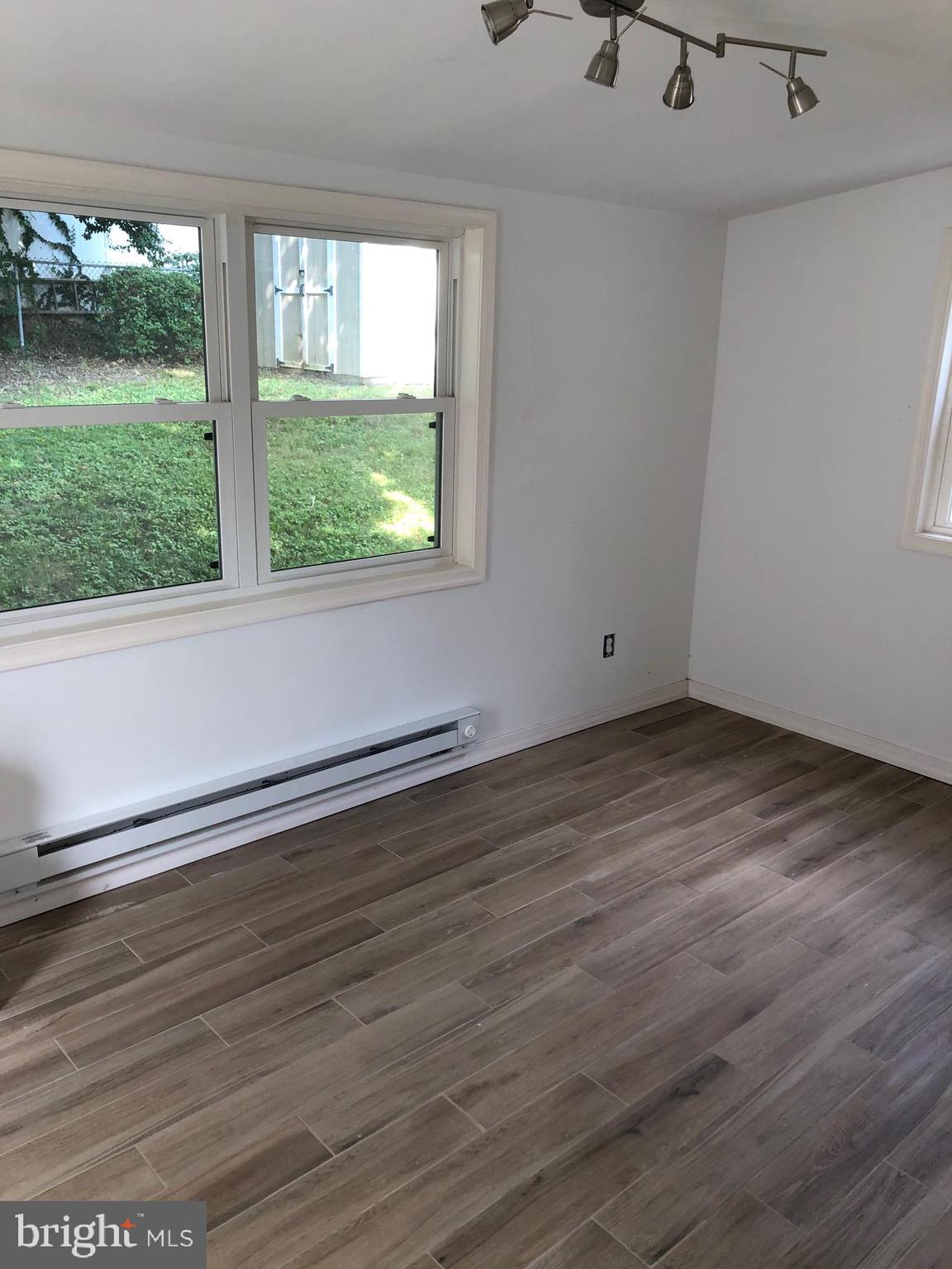 107 Cedar Road Wallingford, PA 19086 - Photo 12 of 30 Dining Room, great wood look ceramic floors