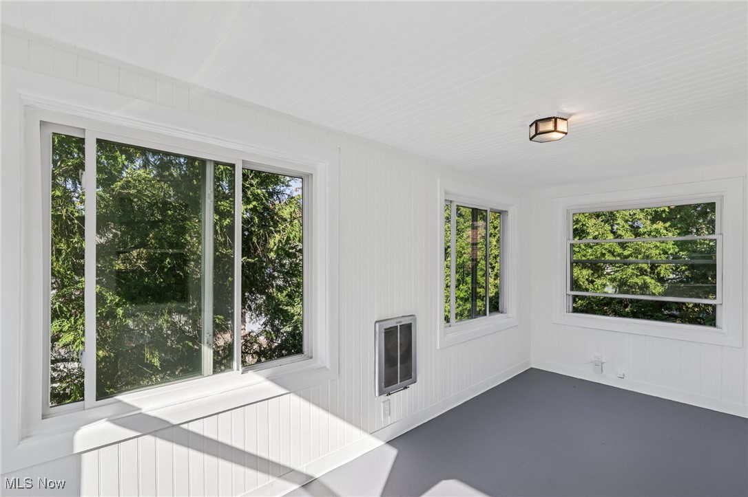 3621 Cedarbrook Road Cleveland, OH 44118 - Photo 31 of 40 Unfurnished sunroom with heating unit