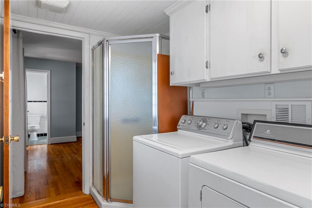 6356 Skylark Road Pfafftown, NC 27040 - Photo 30 of 48 Main level laundry room with shower located off the primary bedroom