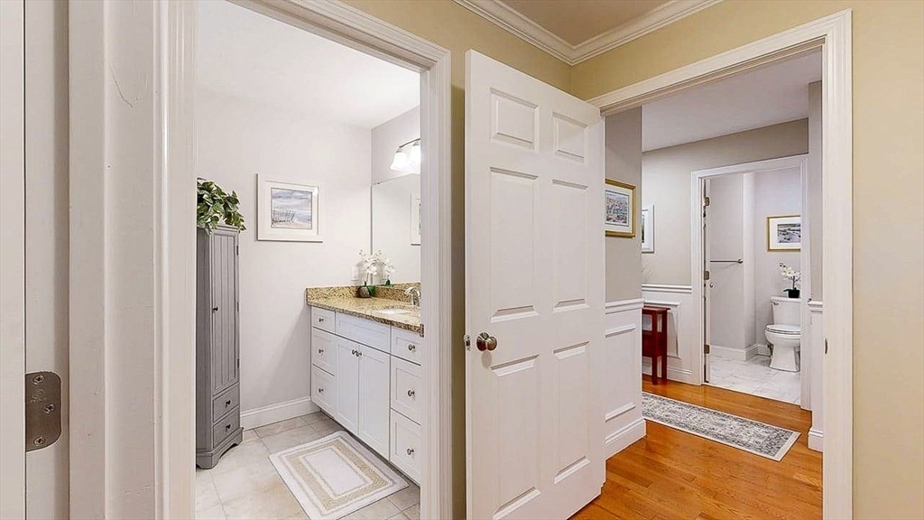 67 Cobblestone Lane, Unit 63 Worcester, MA 01606 - Photo 22 of 38 a view of a kitchen from the hallway
