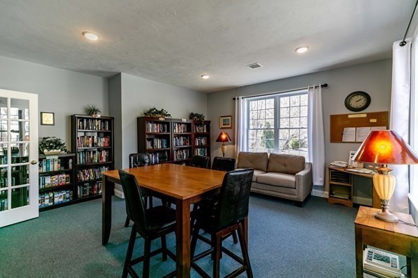 67 Cobblestone Lane, Unit 63 Worcester, MA 01606 - Photo 38 of 38 a view of a livingroom with furniture and window