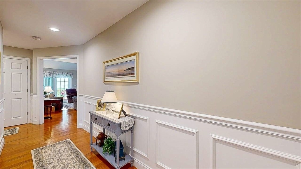 67 Cobblestone Lane, Unit 63 Worcester, MA 01606 - Photo 4 of 38 a living room with furniture and a table
