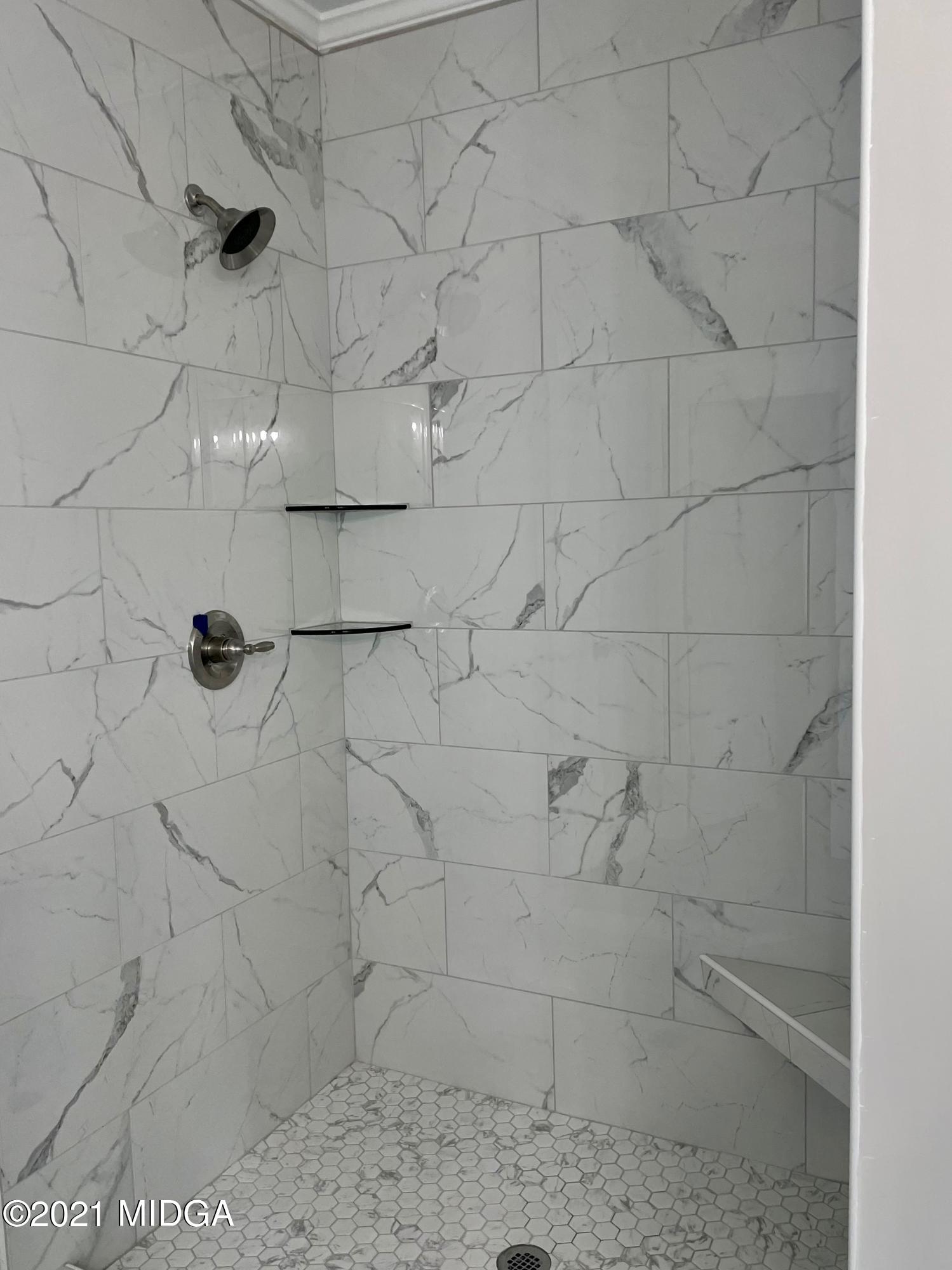 1194 Josey Road Forsyth, GA 31029 - Photo 7 of 9 a bathroom with a shower