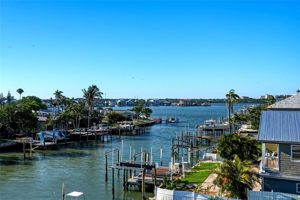 534 Crystal Drive Madeira Beach, FL 33708 - Photo 37 of 68 a view of a lake with a house