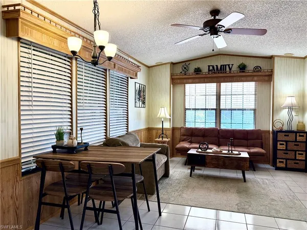 a livingroom with furniture and window