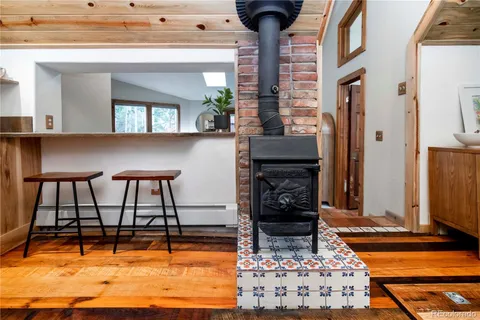 a view of a living room and kitchen view
