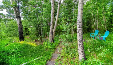 a garden view with a seating space
