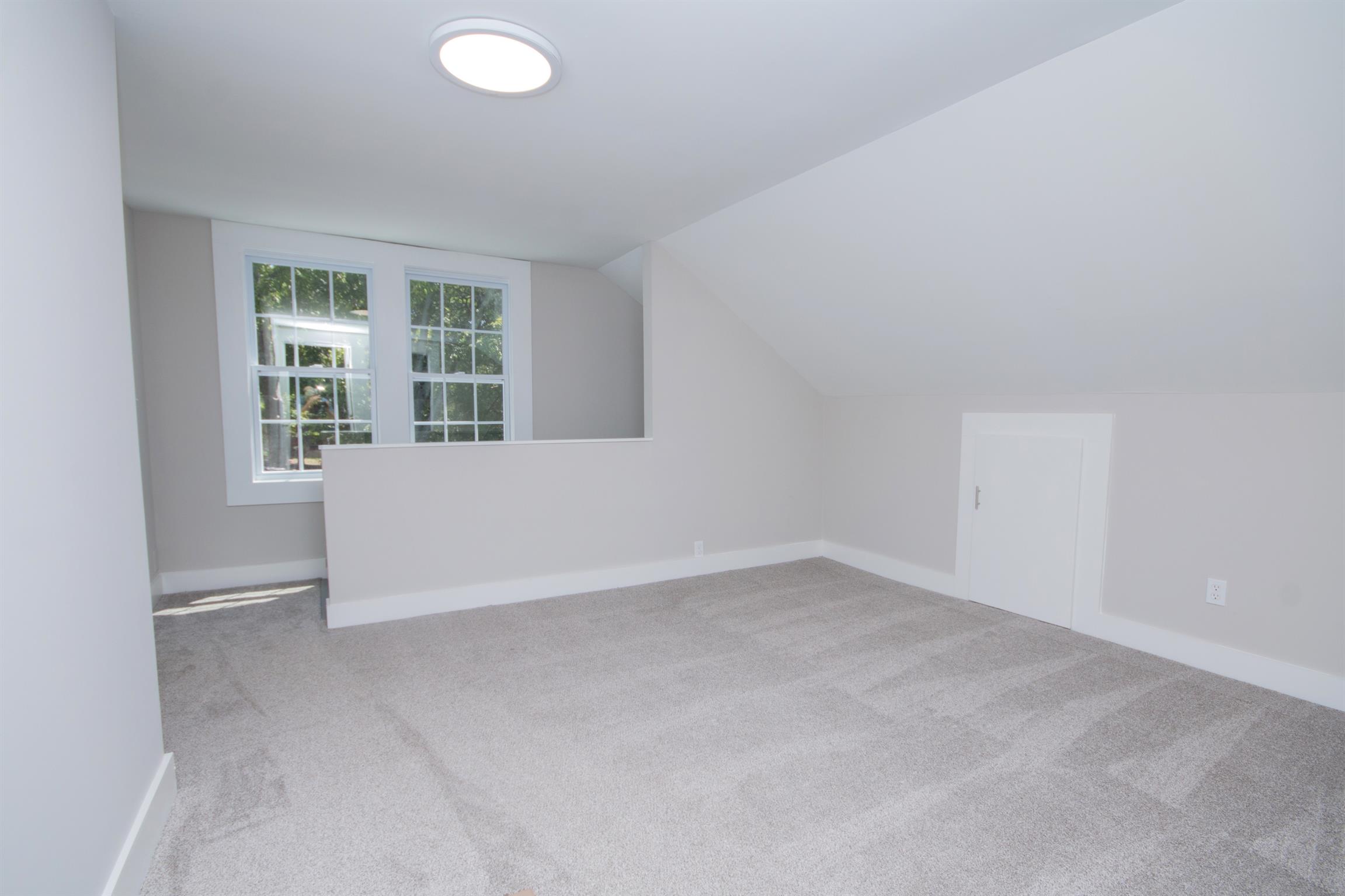 1003 Neelys Bend Road Madison, TN 37115 - Photo 14 of 30 an empty room with windows