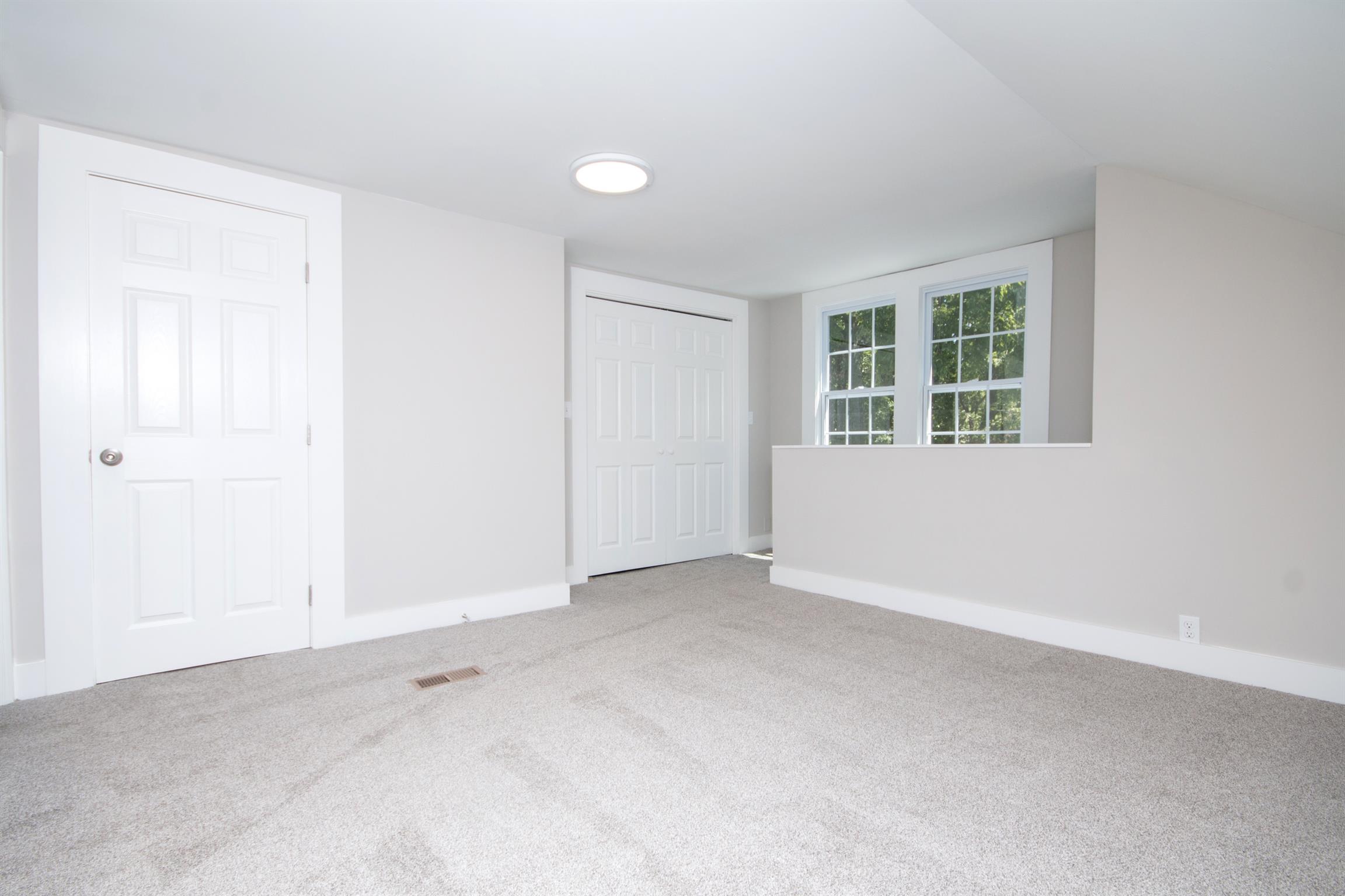 1003 Neelys Bend Road Madison, TN 37115 - Photo 15 of 30 an empty room with a window