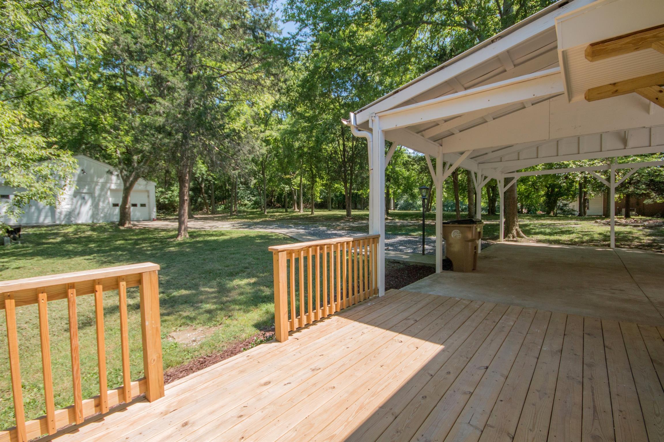 1003 Neelys Bend Road Madison, TN 37115 - Photo 22 of 30 a view of a patio with wooden floor
