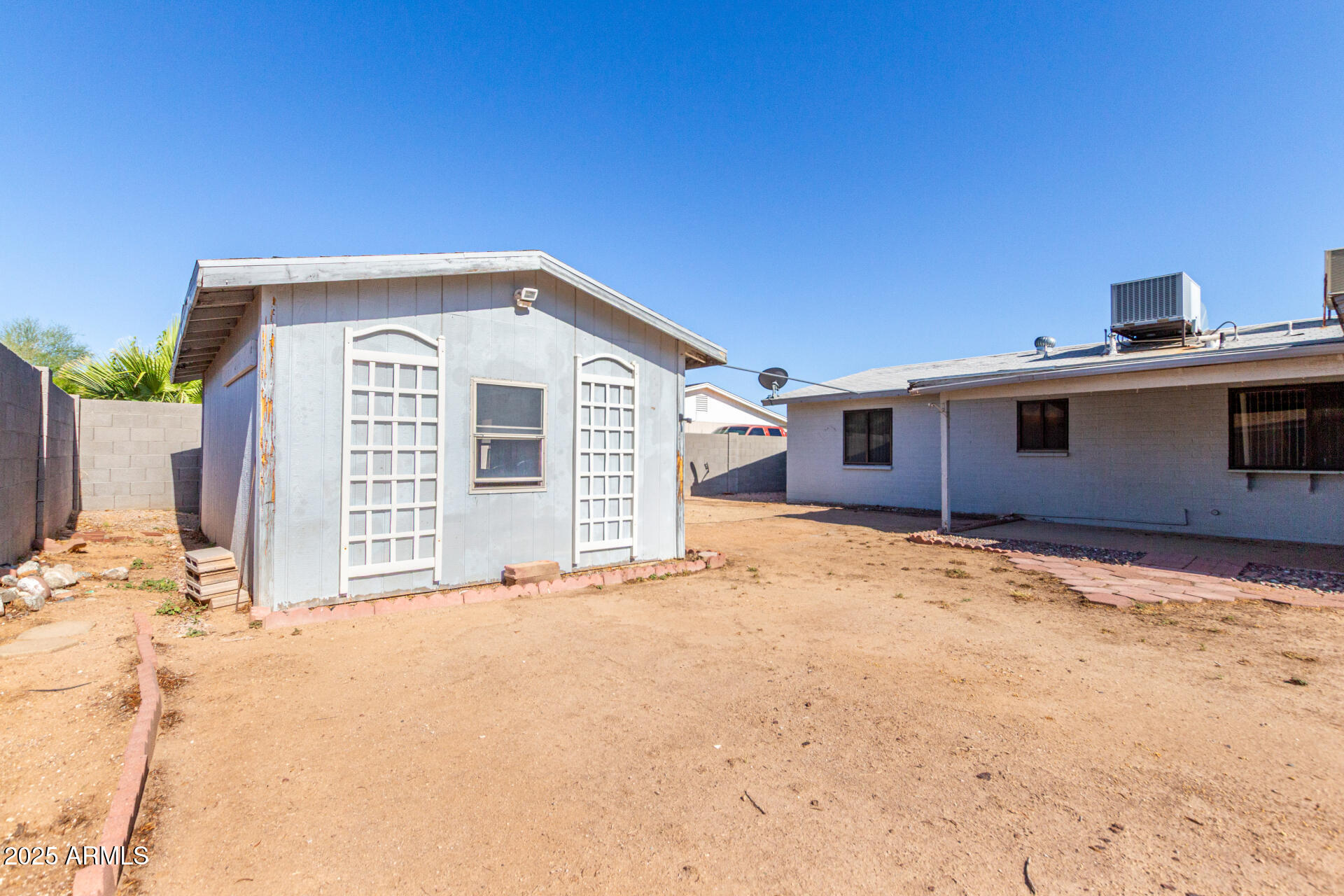 4740 West Bloomfield Road Glendale, AZ 85304 - Photo 34 of 34 a view of a house with a yard