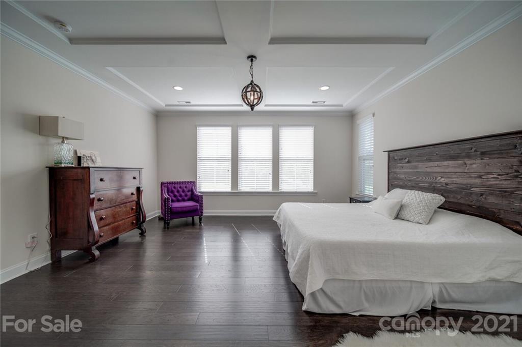 360 Monteray Oaks Circle Fort Mill, SC 29715 - Photo 15 of 44 a bedroom with a bed couch and a window