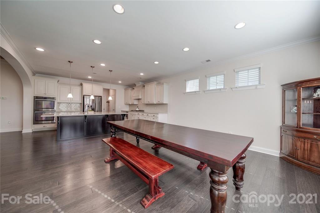 360 Monteray Oaks Circle Fort Mill, SC 29715 - Photo 18 of 44 a living room with furniture and a table
