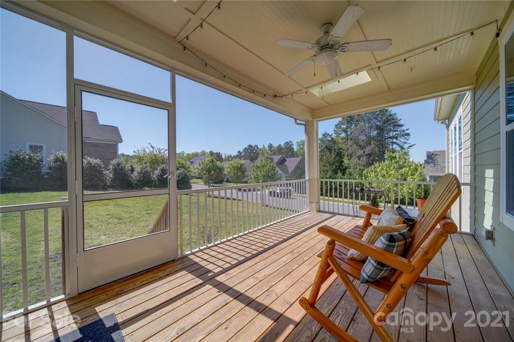 360 Monteray Oaks Circle Fort Mill, SC 29715 - Photo 19 of 44 a view of a balcony with two chairs and a table