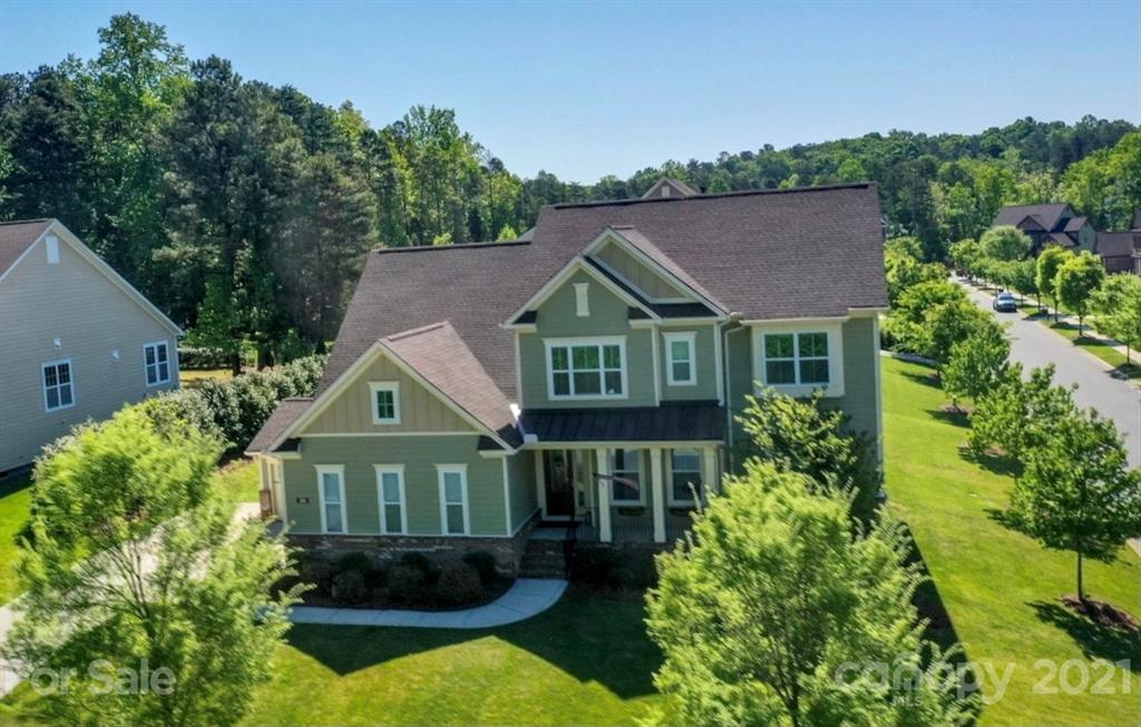 360 Monteray Oaks Circle Fort Mill, SC 29715 - Photo 3 of 44 a view of a house with a yard and potted plants