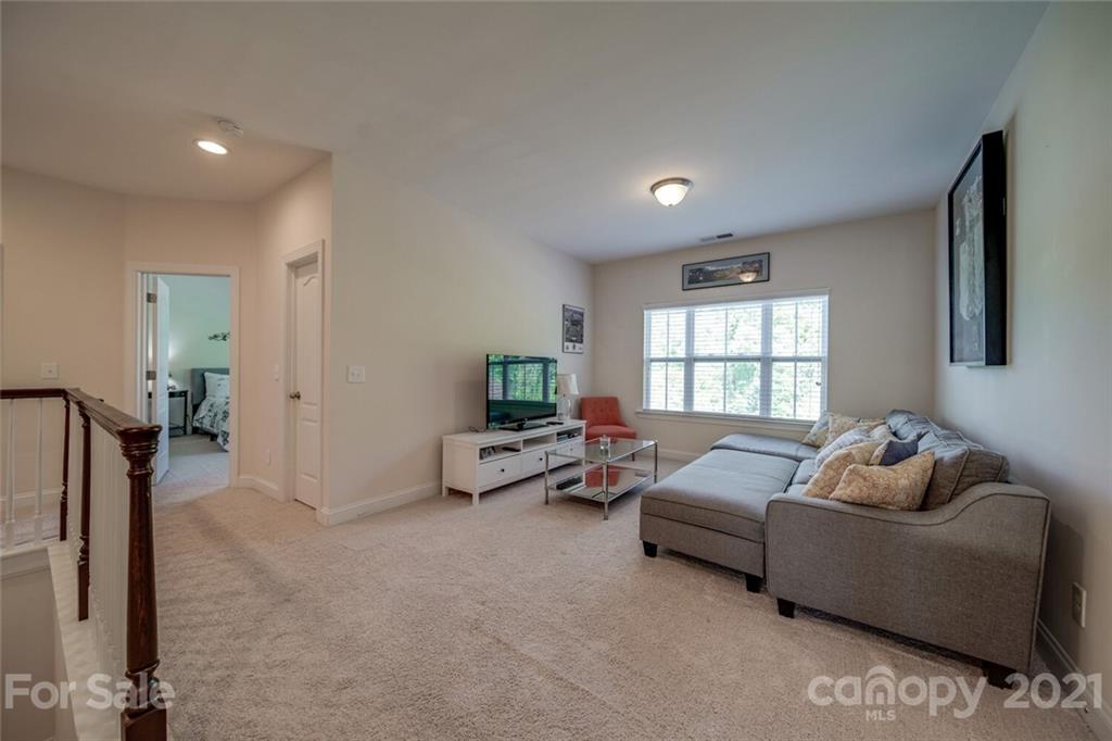 360 Monteray Oaks Circle Fort Mill, SC 29715 - Photo 28 of 44 a living room with furniture and a window