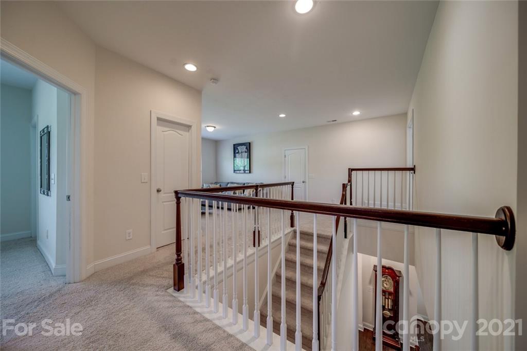 360 Monteray Oaks Circle Fort Mill, SC 29715 - Photo 30 of 44 a view of hallway with stairs