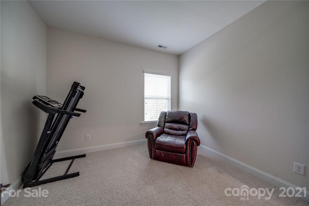 360 Monteray Oaks Circle Fort Mill, SC 29715 - Photo 38 of 44 a bedroom with furniture and a window