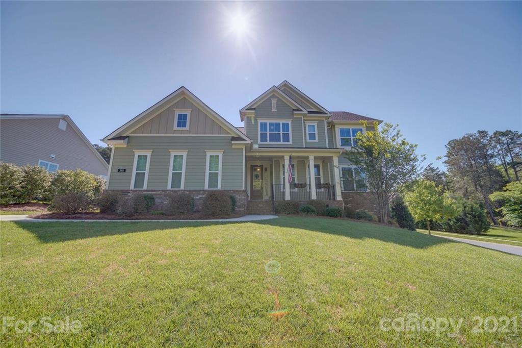 360 Monteray Oaks Circle Fort Mill, SC 29715 - Photo 41 of 44 a front view of a house with a yard
