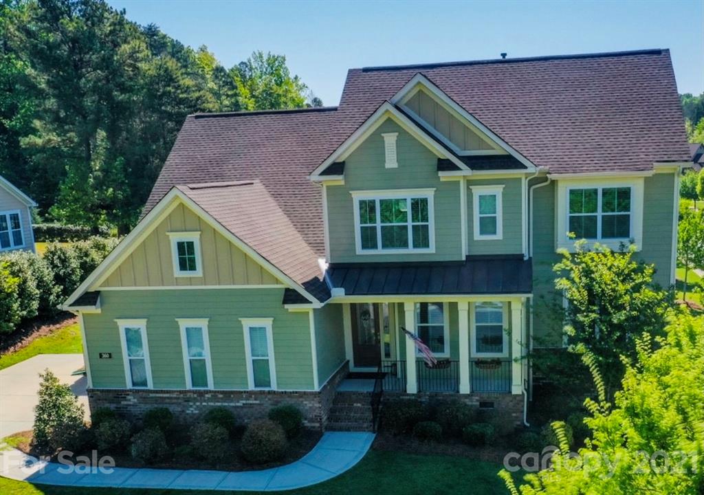 360 Monteray Oaks Circle Fort Mill, SC 29715 - Photo 44 of 44 a front view of a house with garden