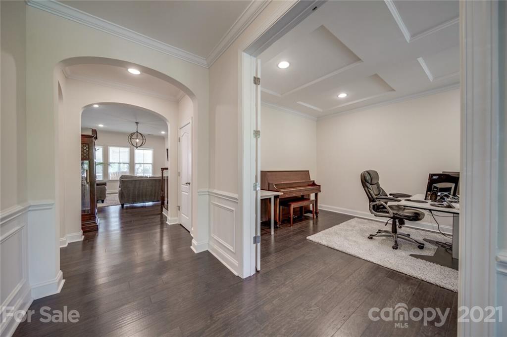 360 Monteray Oaks Circle Fort Mill, SC 29715 - Photo 6 of 44 a view of a hallway with workspace and a couch