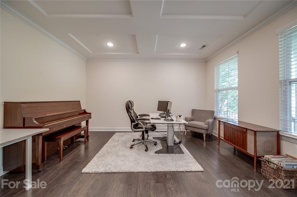 360 Monteray Oaks Circle Fort Mill, SC 29715 - Photo 7 of 44 a living room with furniture a piano and wooden floor