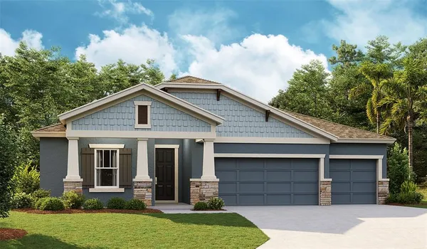 front view of a house with a yard