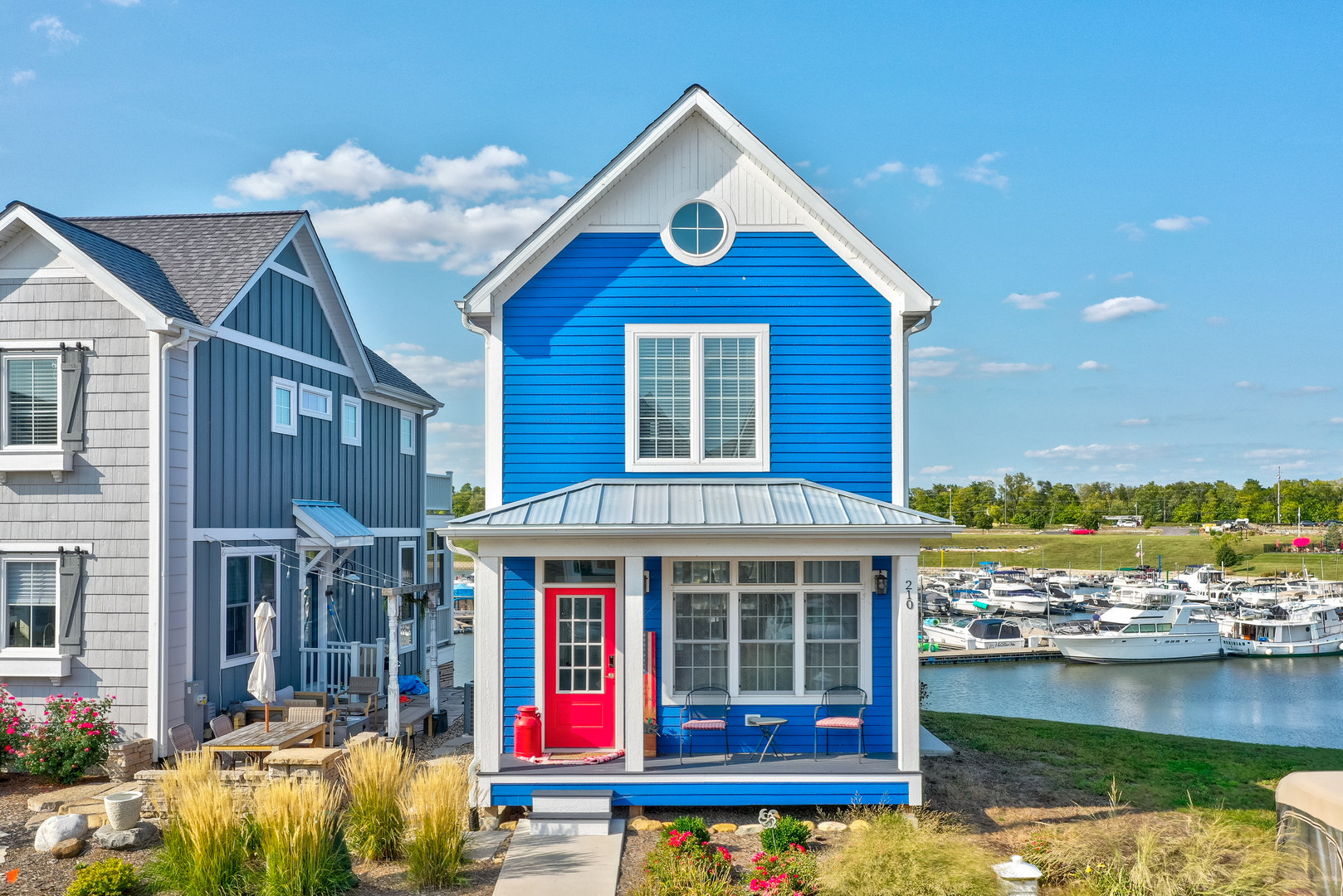 a front view of a house with lake view